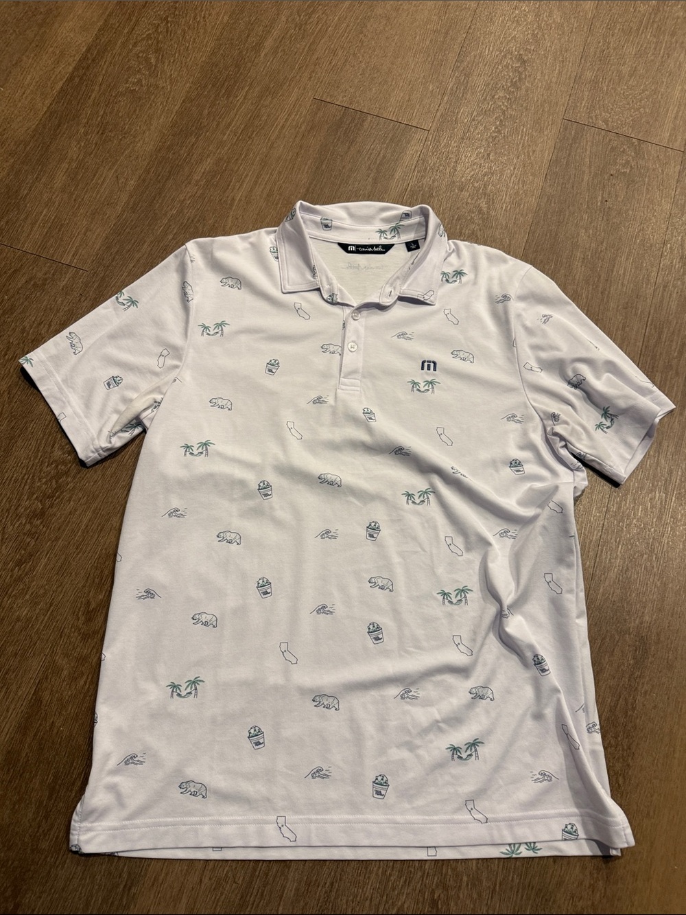Travis Mathew White Polo with Green & Gray Beach Icons
